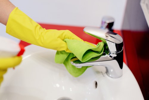 Cleaner preparing a service checklist before a cleaning appointment