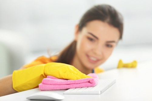 Cleaner reviewing wellbeing and safety responsibilities