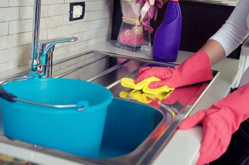 Local cleaner maintaining a kitchen and bathroom in Oho